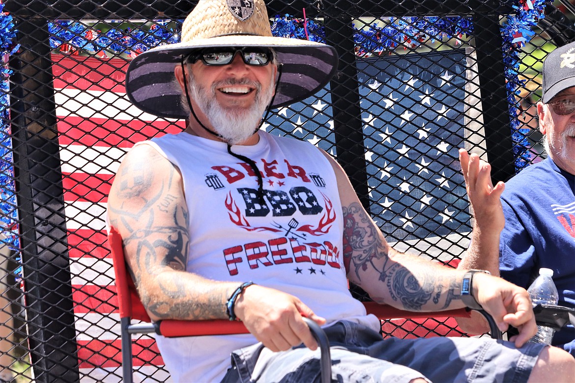 Micheal McInelly enjoys a ride through the Bayview Daze parade.