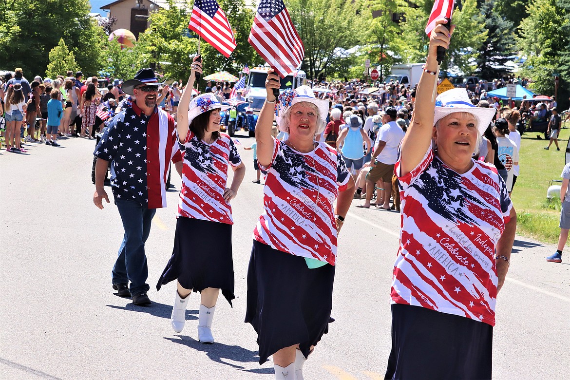 Members of the North Idaho Sparklers show their moves in the Bayview Daze parade on Saturday.