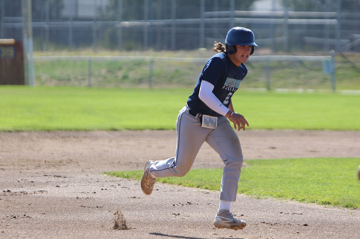 River Dog first baseman Hayden Meek runs to third base against Whatcom Post 7 on Friday.