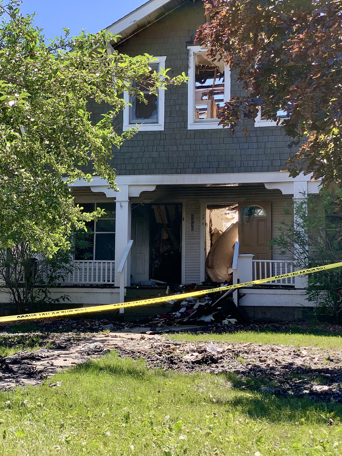 A blaze destroyed a multi-residential home on Second Street West in
Kalispell Saturday night. Kalispell Fire Department firefighters continued to monitor the scene through Sunday, June 2. (Hilary Matheson/Daily Inter Lake)