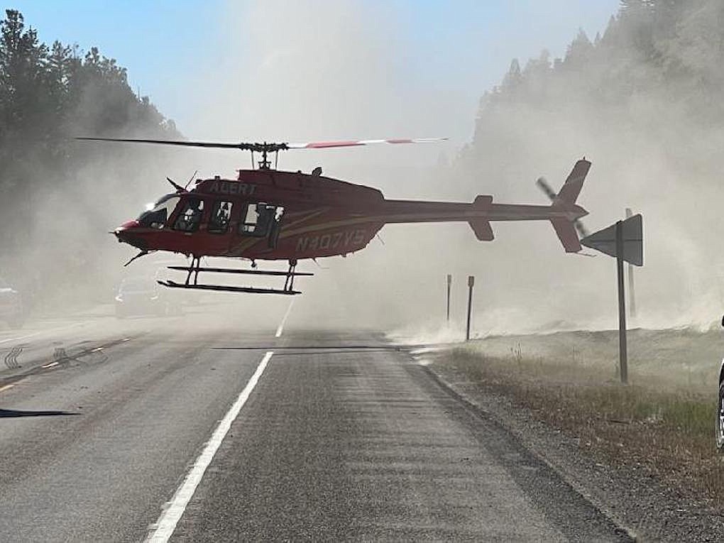 An ALERT helicopter lands at the scene of an ATV accident Saturday on U.S. 2. (Suzanne Resch)