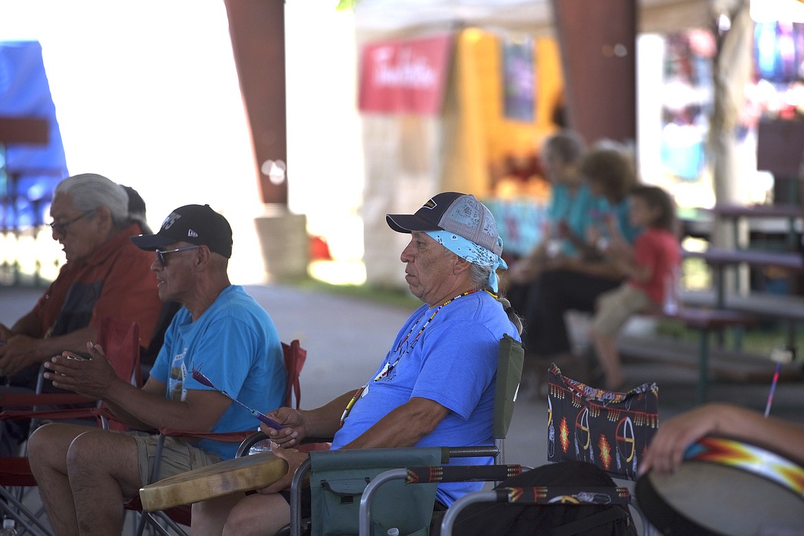 Member of drum group is poised to begin a song in the smaller pavilion of the Arlee Powwow. (Max Dupras/Leader)