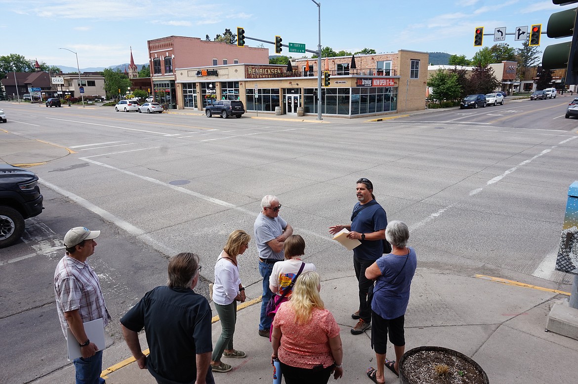 Participants in the Northwest Montana History Museum's guided walking tour make their way through downtown Kalispell earlier this year. The tours jump off every Monday at 10 a.m. through Sept. 25. (Summer Zalesky/Daily Inter Lake)