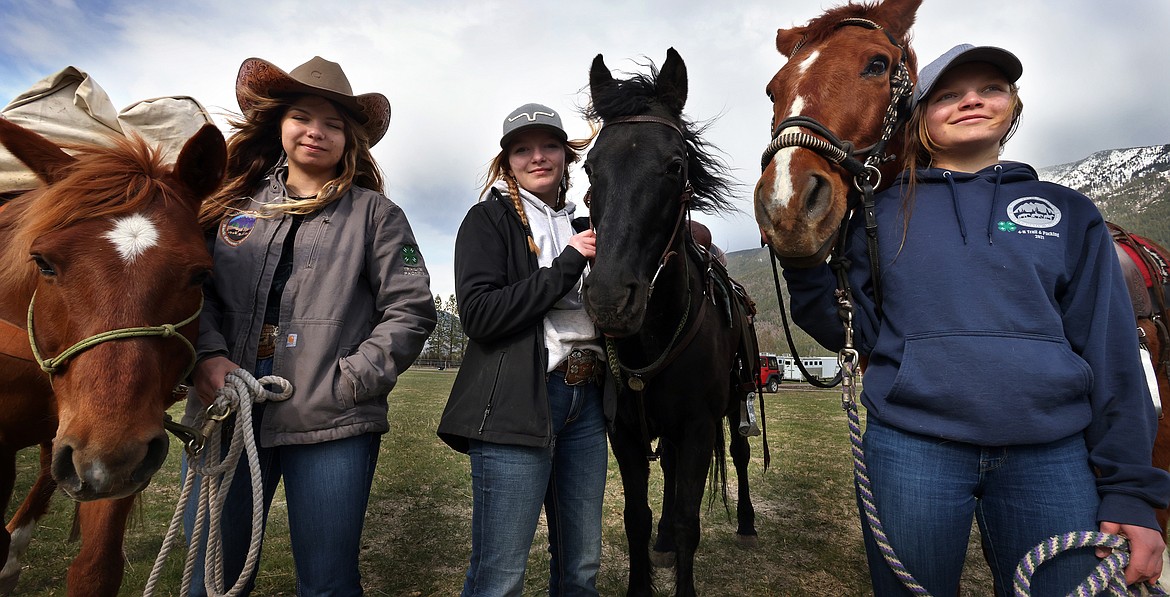 Hannah (left), Brady (middle) and Kimber Boll have been putting their horse packing skills to good use, teaching others as part of 4-H and Northwest Montana Back Country Horsemen projects in this May 2022 file photo. (Jeremy Weber/Daily Inter Lake FILE)