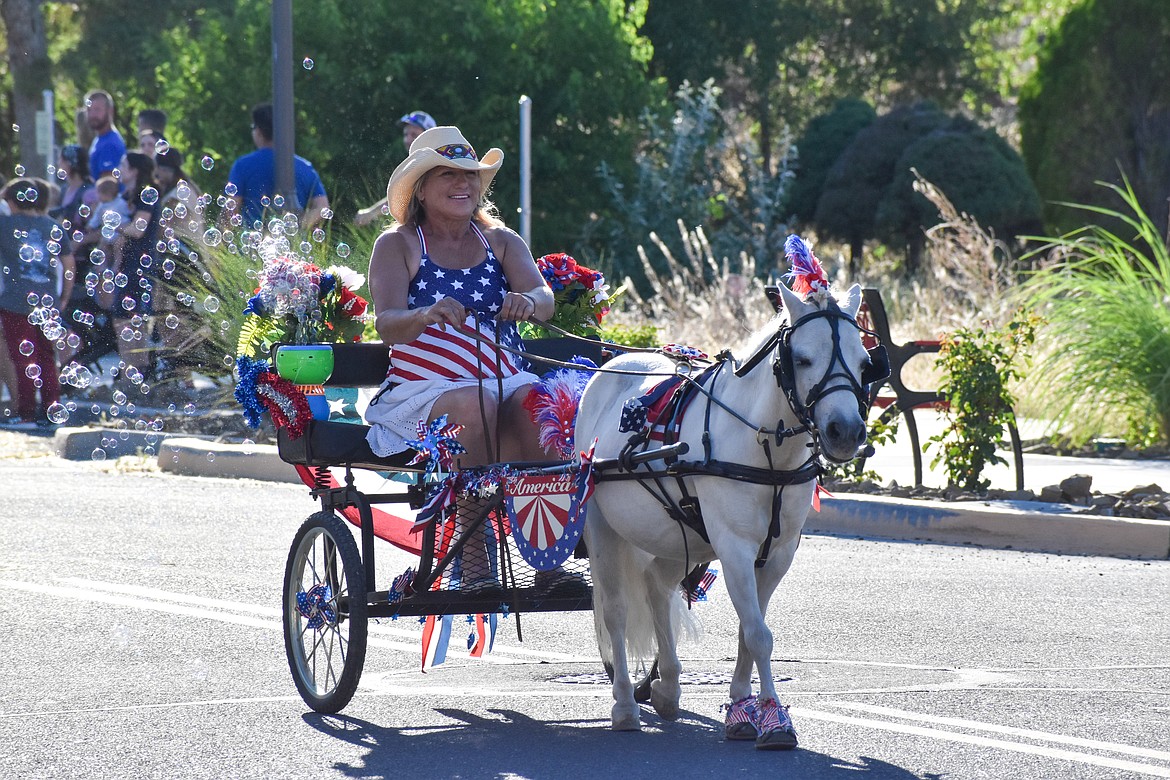 The parade earned smiles from attendees as well as participants celebrating the Independence Day weekend.