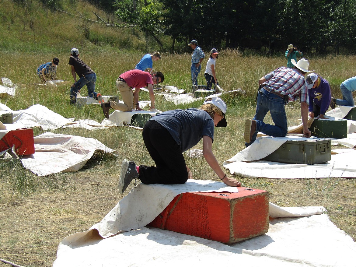 Teens learn how to pack for traveling by horse in the backcountry. (Photo provided by the Back Country Horsemen)