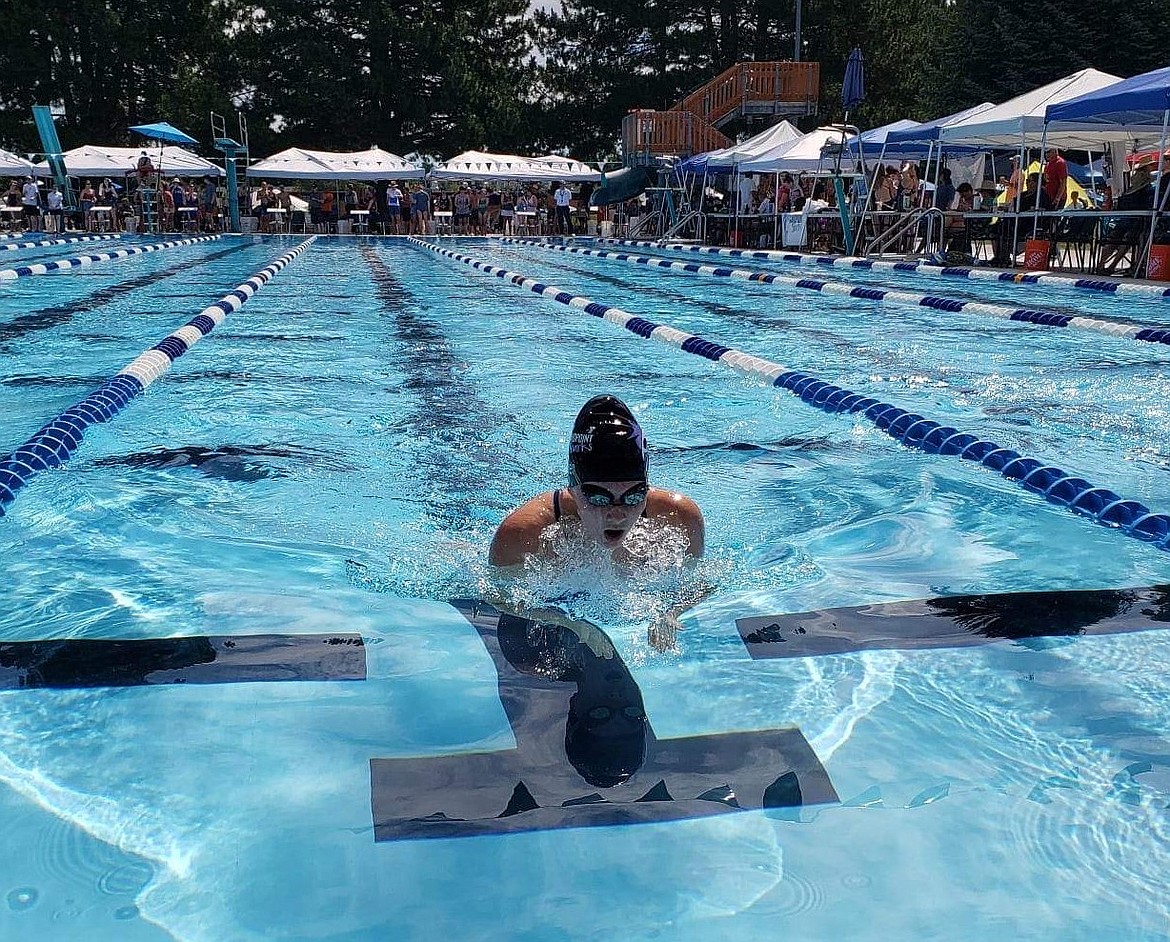 Ryleigh Bamer competes in the 100-meter breaststroke.