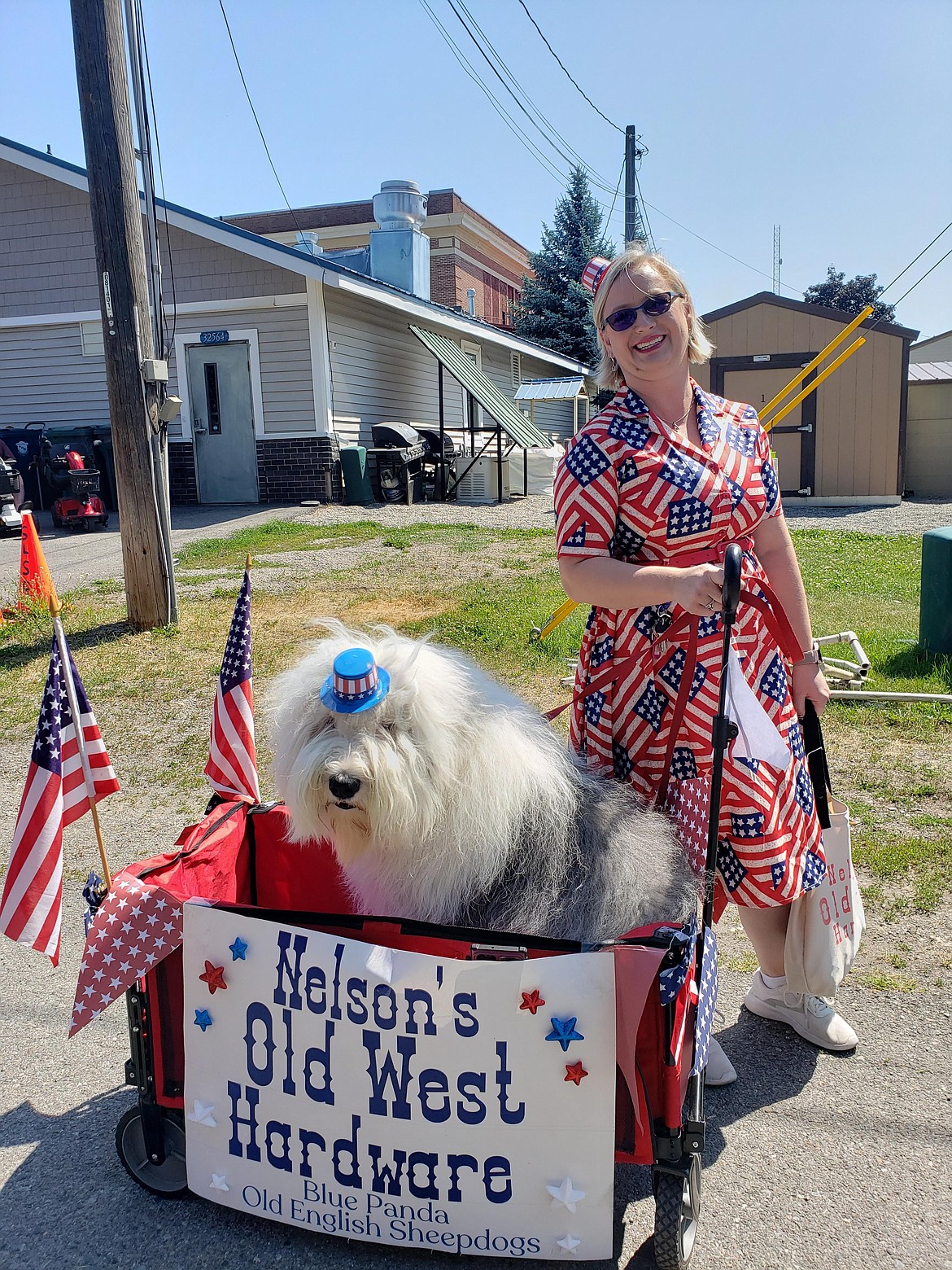 Kevin and Breanne Nelson smile as they prepare for the Spirit Lake Fourth of July Parade to begin.