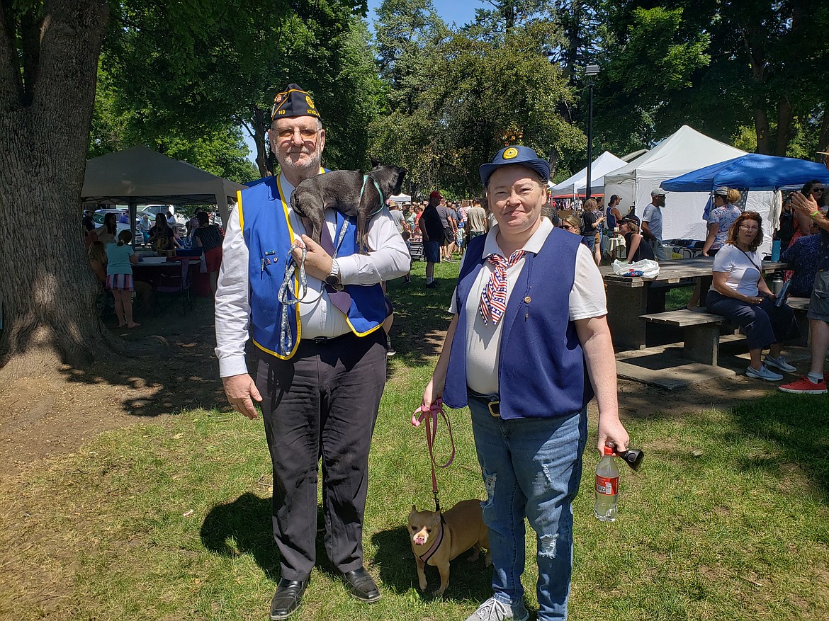 American Legion Post 149 Second Vice Lenard Hoener, his wife and Sgt. at Arms Tracy Hoener, and their dogs Midnight and Mily walked in the Spirit Lake Old Fashioned  Fourth of July Parade with their Legion.