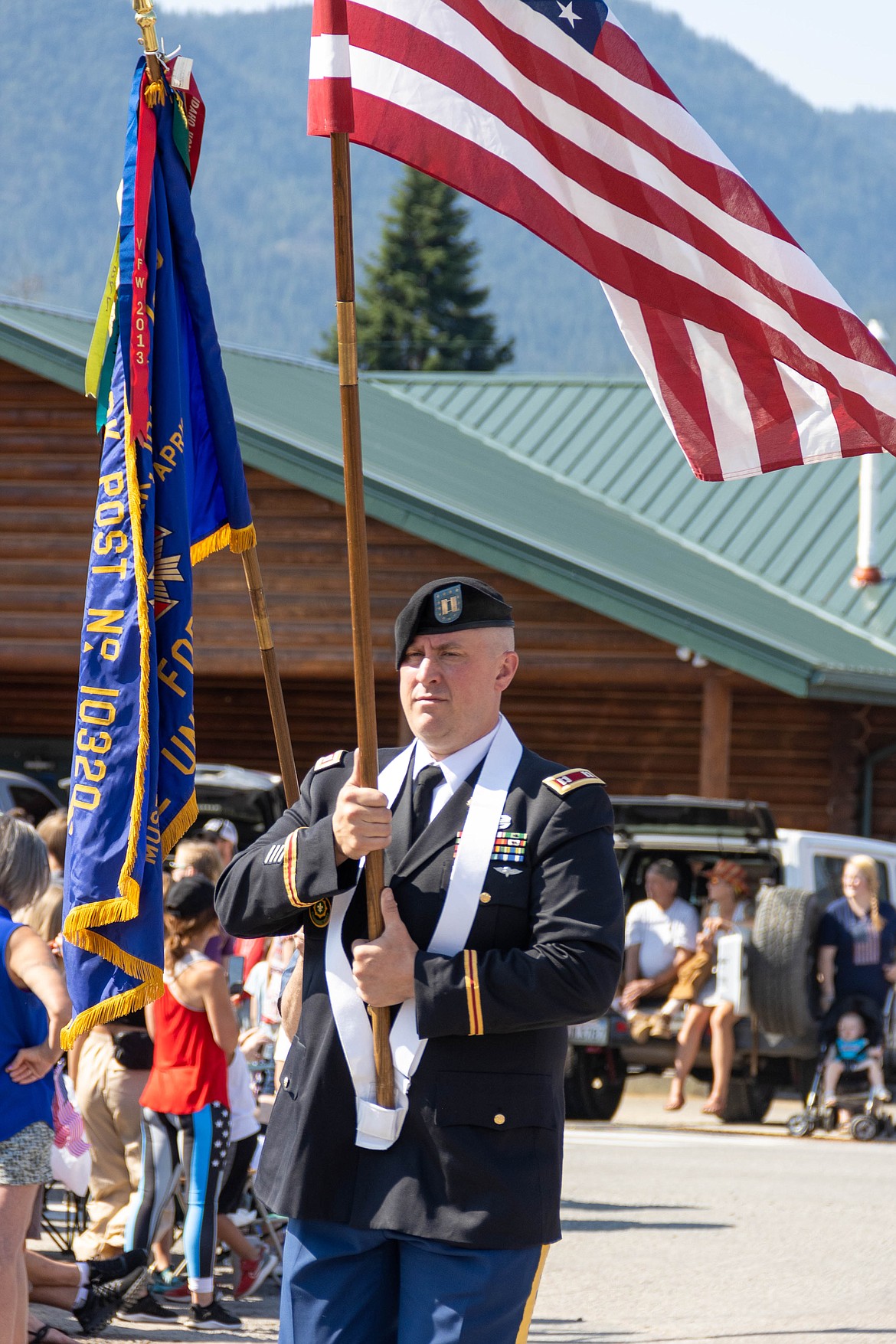 A soldier takes part in the Clark Fork Fourth of July parade on Tuesday.