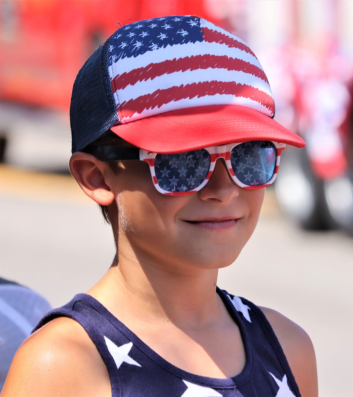 A patriotic Keegan Rosenberg watches the Fourth of July parade in Coeur d'Alene on Wednesday.