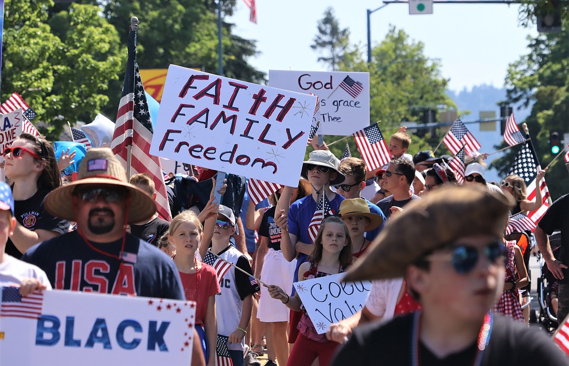 A group marches for faith, family and freedom in the Fourth of July parade in Coeur d'Alene.