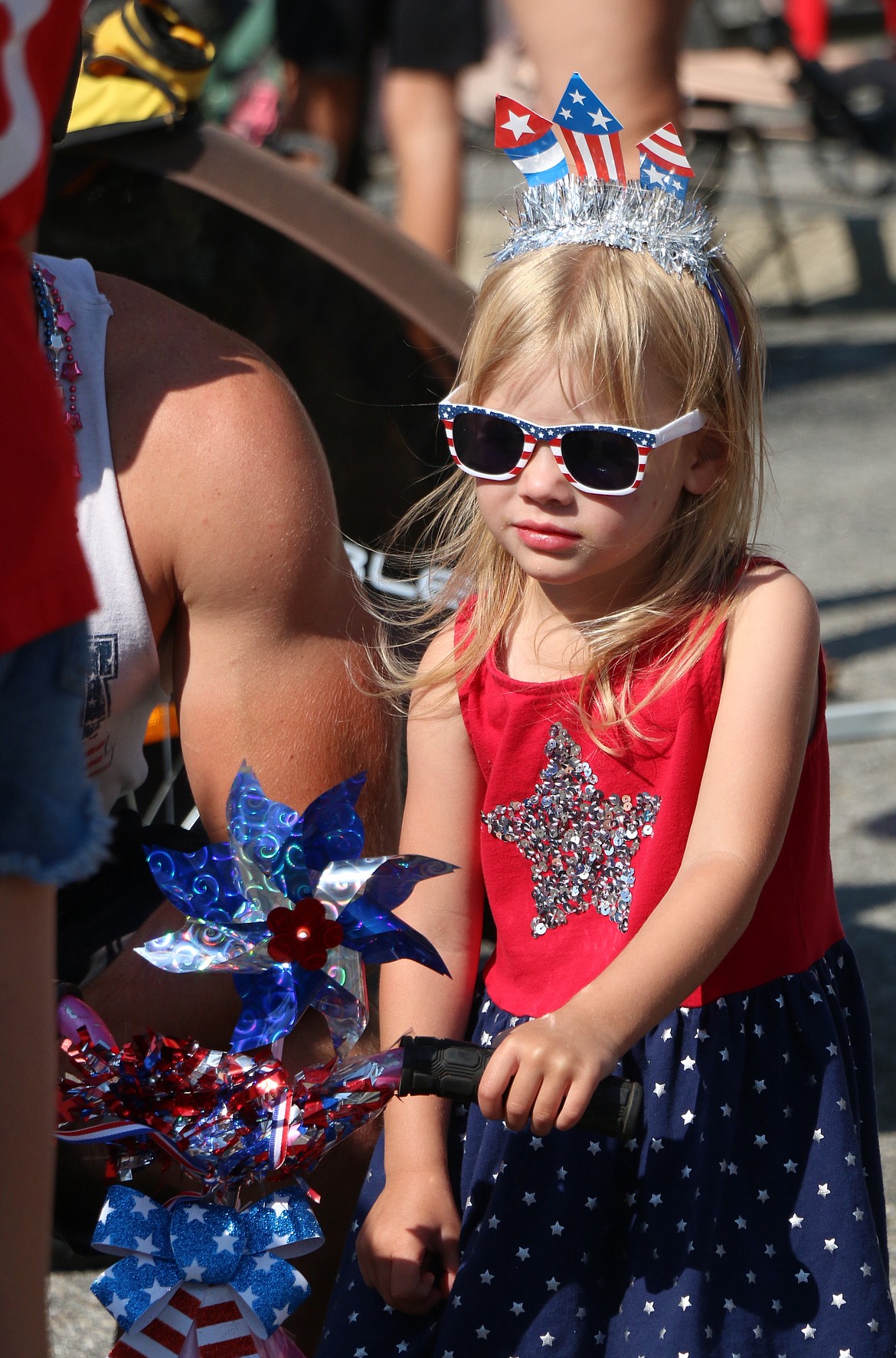 A youngster waits for the start of the Sandpoint Lions kids parade which led of the grand parade on the Fourth of July.