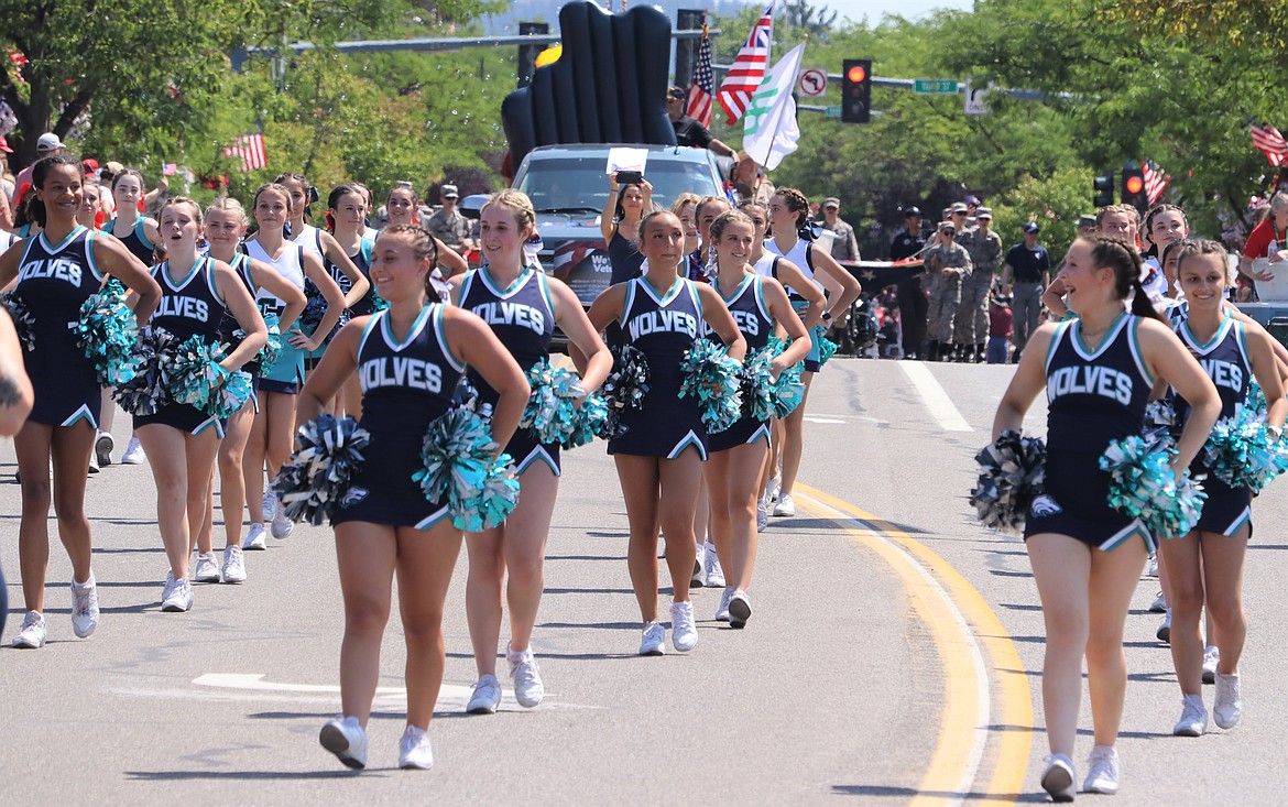 Lake City High School cheerleaders march in the Fourth of July parade on Tuesday in Coeur d'Alene.