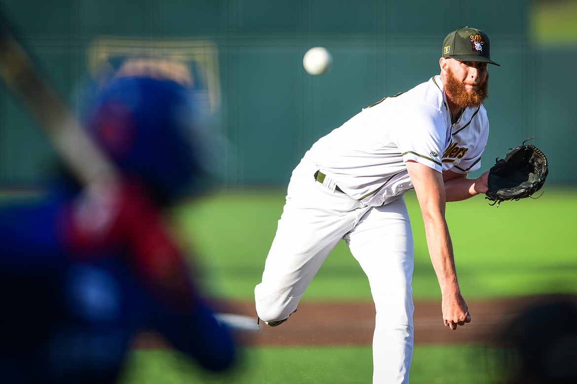 Glacier Range Riders starting pitcher Rob Hamby (33) delivers to the Ogden Raptors' Reese Alexiades (7) in the first inning at Glacier Bank Park on Wednesday, July 5. (Casey Kreider/Daily Inter Lake)