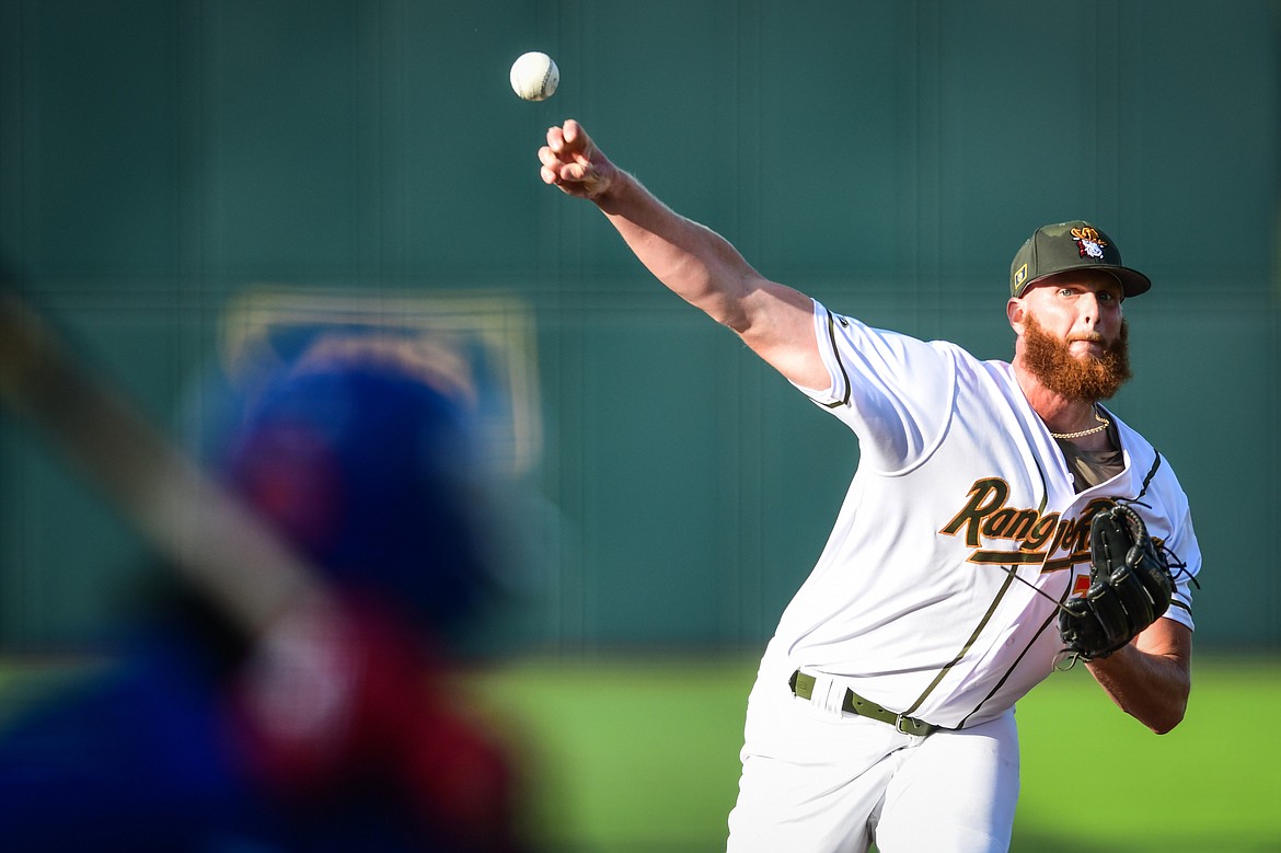 Glacier Range Riders starting pitcher Rob Hamby (33) delivers to the Ogden Raptors' Reese Alexiades (7) in the first inning at Glacier Bank Park on Wednesday, July 5. (Casey Kreider/Daily Inter Lake)