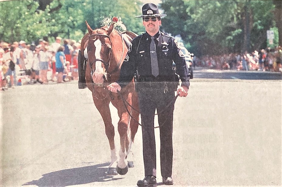 ISP Sgt. Jay Komosinski honors fallen comrade Linda Huff.