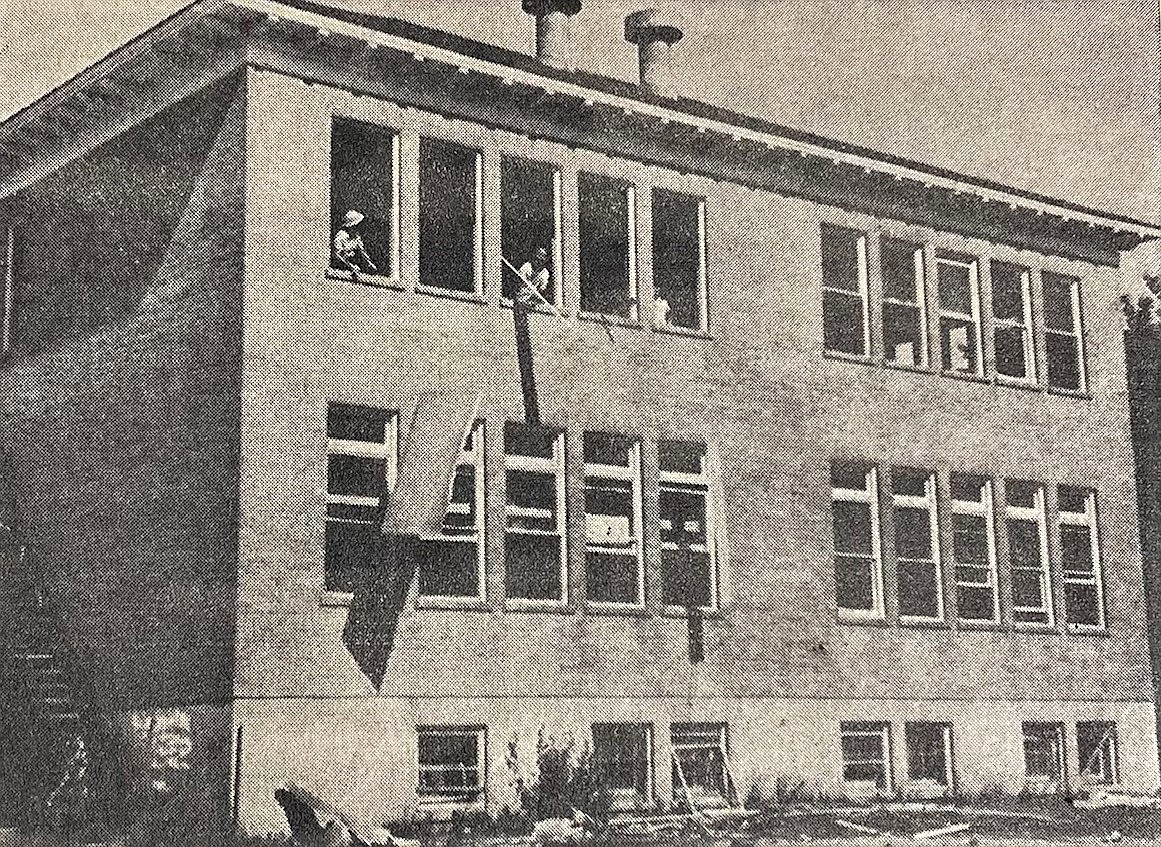 Workers demolish old Bryan School.