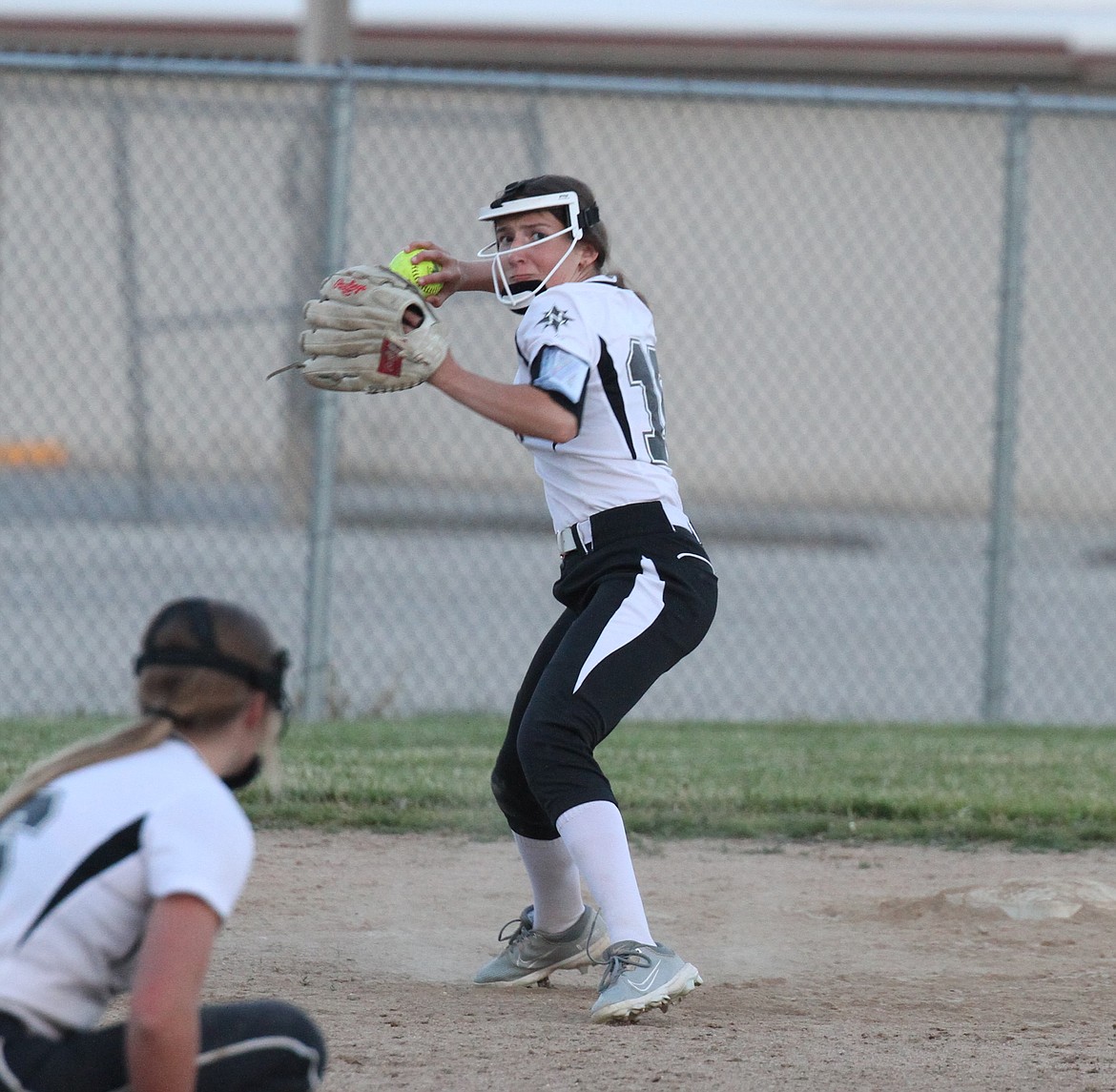 Ryelle Short gets ready to make a throw to first base after fielding a ground ball at third in a game earlier this season for The North 16U. Short plays for both The North's 16U and 14U teams.