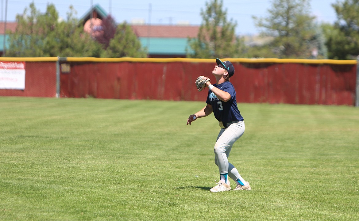 River Dog second baseman Zane Harden stands underneath a fly ball in the outfield at the Spokane Wood Bat Classic.