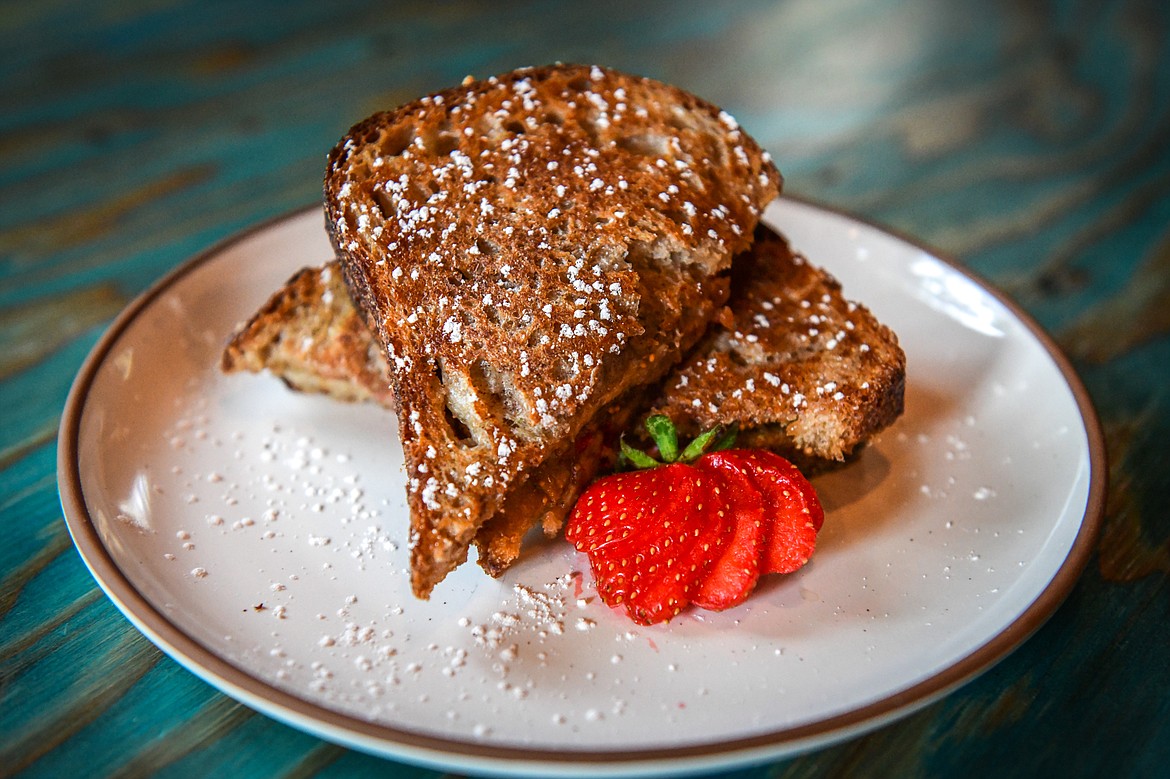 The French Toasted Cashew & Fig with Blu's bread, maple cashew butter, fig jam, fresh fruit and french toasted and grilled at Max's in Bigfork on Saturday, July 8. (Casey Kreider/Daily Inter Lake)