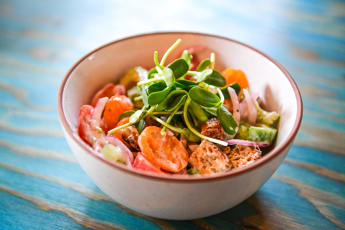 The Panzenella featuring garden fresh tomatoes and cucumber, red onion, Ferguson Farms microgreens, house vinaigrette and Blu's bread croutons at Max's in Bigfork on Saturday, July 8. (Casey Kreider/Daily Inter Lake)