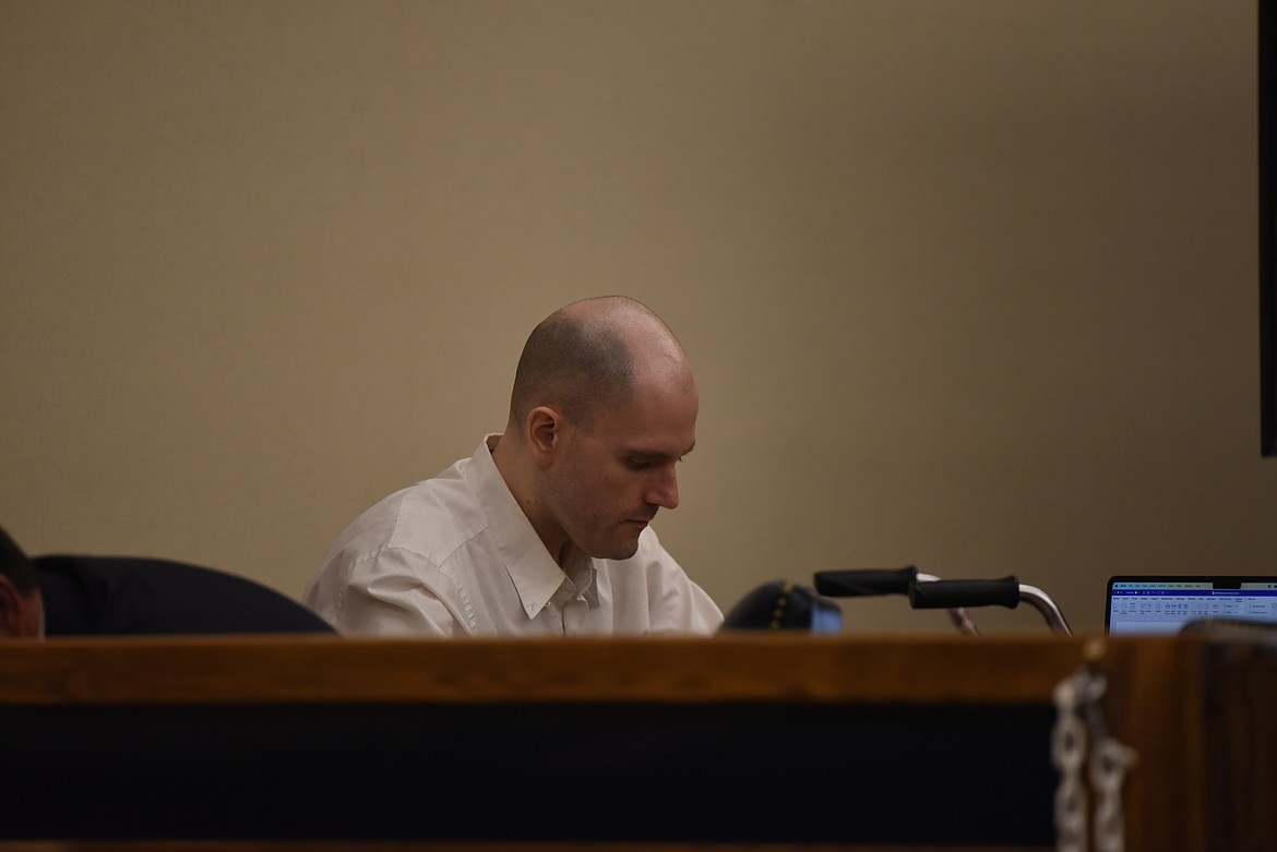 Jonathan Douglas Shaw sits at the defendant's table in Flathead County District Court as his murder trial gets underway July 10, 2023. (Derrick Perkins/Daily Inter Lake)