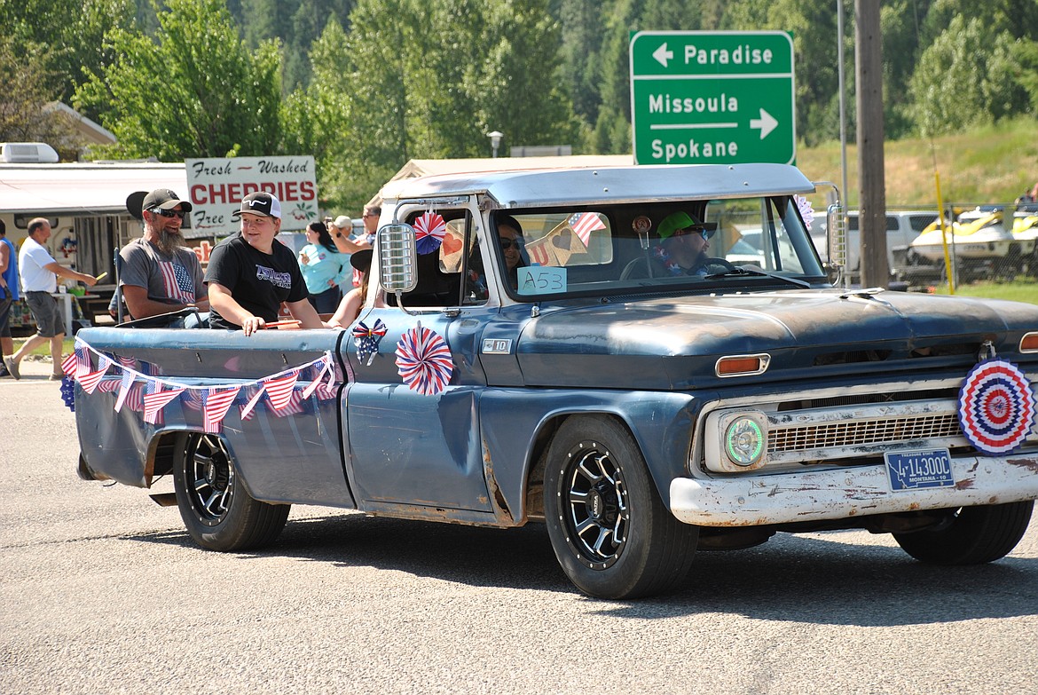 The Imes family, Justin, Melany, Katelyn and Jaidyn drove a blue Chevy pickup in the parade that many from St. Regis School would recognize. The old truck once belonged to the district and was used as a work vehicle and parked on the school grounds for many years. (Mineral Independent/Amy Quinlivan)