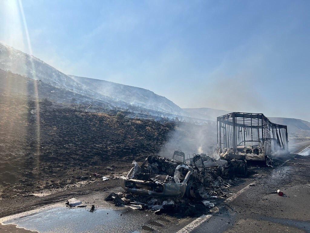 A semi hauling vehicles caught fire Saturday morning on I-90 near the Wild Horse monument. The blaze spread to about 100 acres before it was contained.