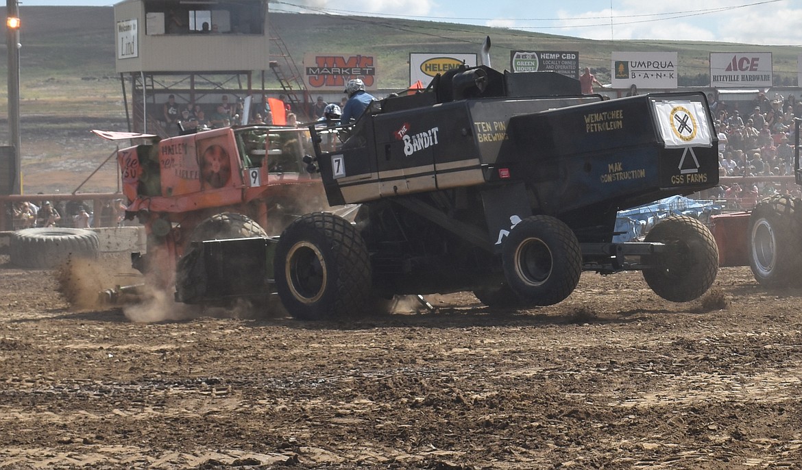 Ryan Kulm lifts two of The Bandit’s wheels off the ground as he rams Lock Jaw, driven by Jeff Solbrack.