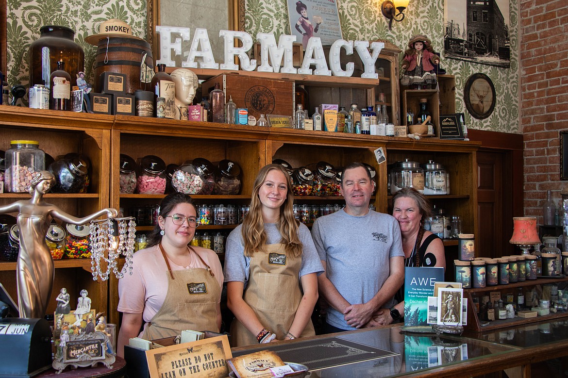 From left to right, shop employees Avani Kincheloe and Danica Cate and shop owners Paul Grove and Indigo Grove are seen in the Montana Farmacy in Eureka, Montana. (Kate Heston/Daily Inter Lake)