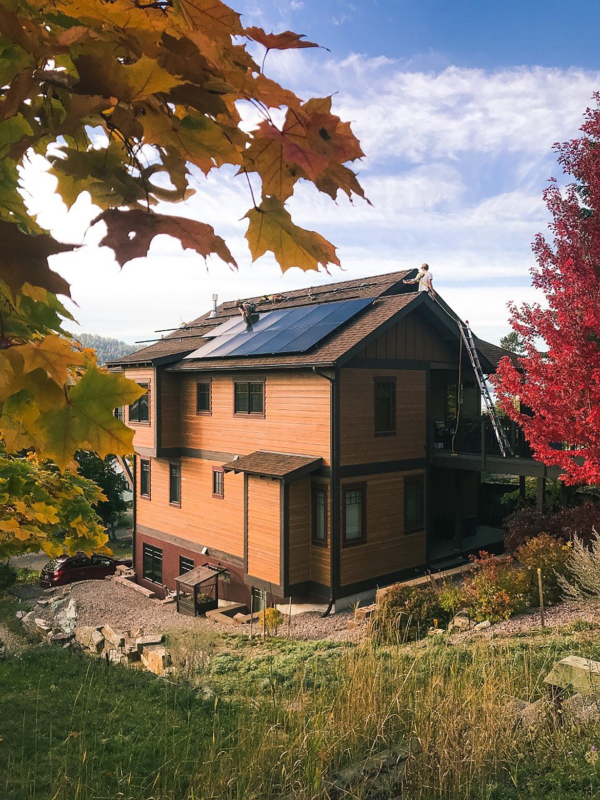 Northstone Solar installs panels atop a home in Whitefish. (Curran Edland photo)