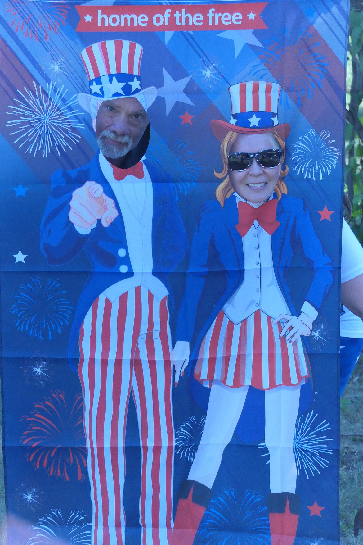 Plains residents Rocky Hart and Heather Allan strike patriotic poses during Independence Day festivities in Fred Young Park. (Chuck Bandel/VP-MI)