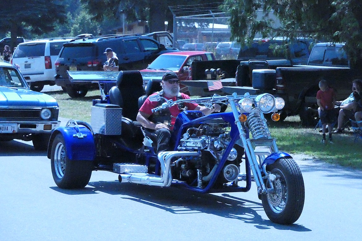 A custom Harley stretch bike cruises through Noxon as part of the Independence Day parade last week.  (Chuck Bandel/VP-MI)