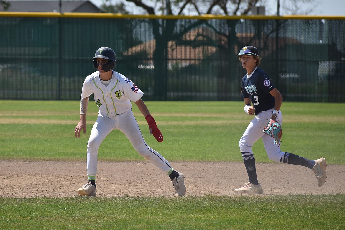 A Stilly Venom player, left, leads off of second base during Sunday’s 14U North Washington State Tournament on Sunday in Moses Lak