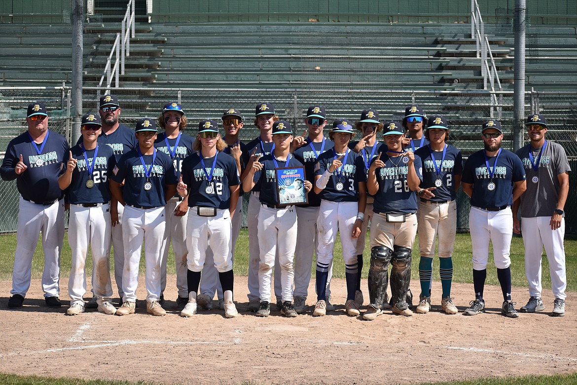 The 14U Columbia Basin River Dogs smile for photos after winning the 14U North Washington State Tournament on Sunday in Moses Lake.