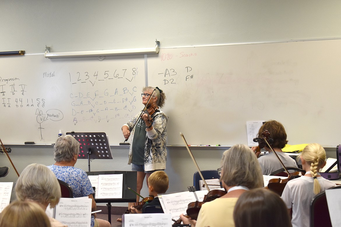 Sheila Wright leads a class in lower intermediate fiddle Tuesday at the Washington Old Time Fiddlers Fiddle Camp in Moses Lake.