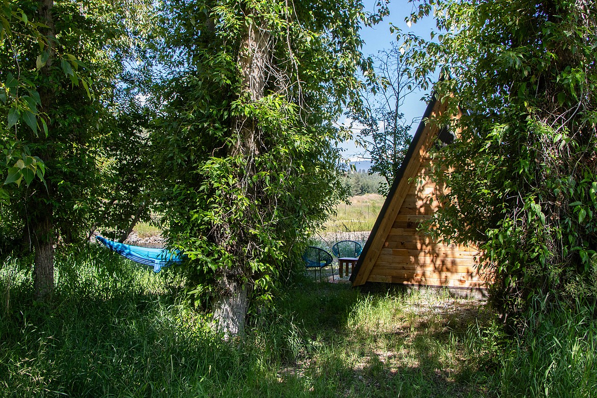 The A-Frame campsite on the Tobacco River Ranch sits next to a blue hammock at the end of June 2023. (Kate Heston/Daily Inter Lake)
