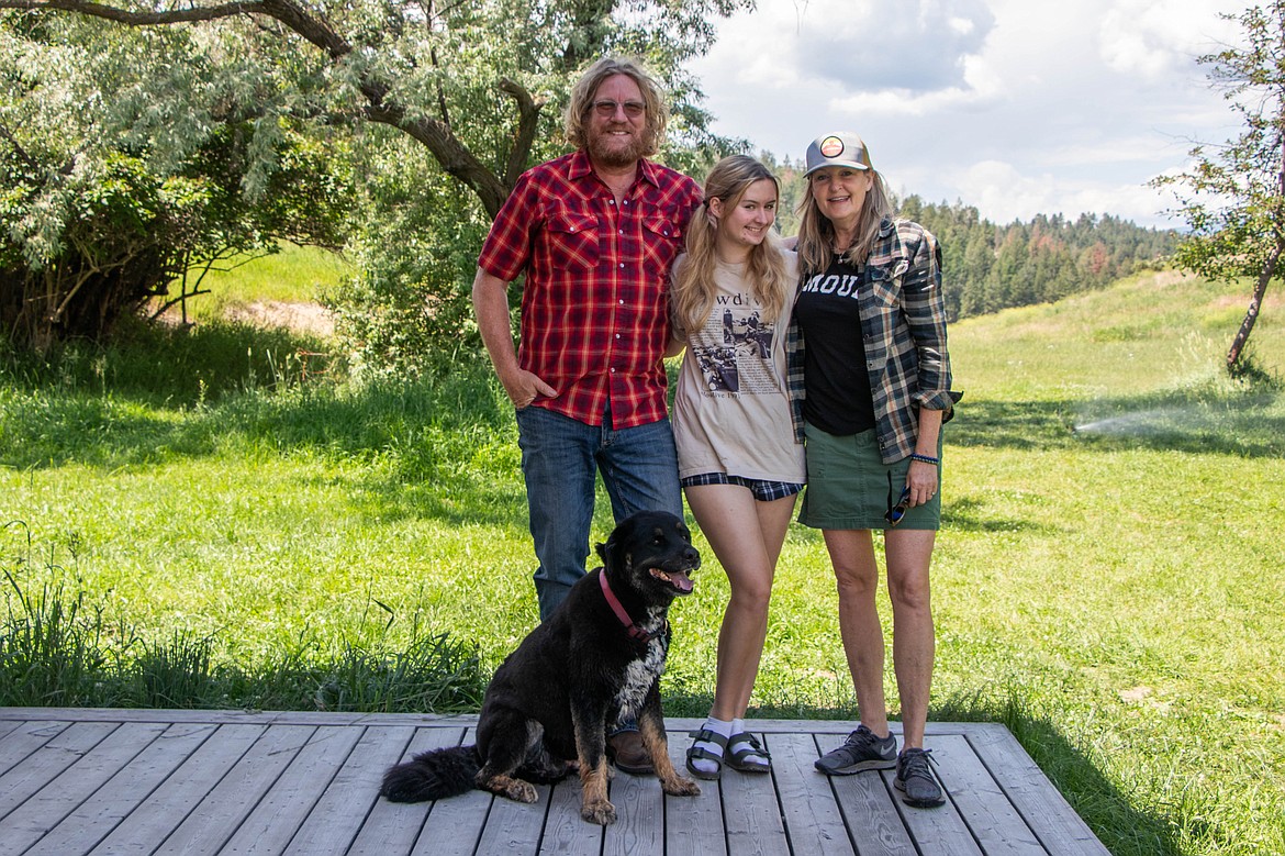 Karl Kassler, Coco Eisinger and Nikki Eisinger are seen at the Tobacco River Ranch, where they host glampers at various cabin sites. (Kate Heston/Daily Inter Lake)