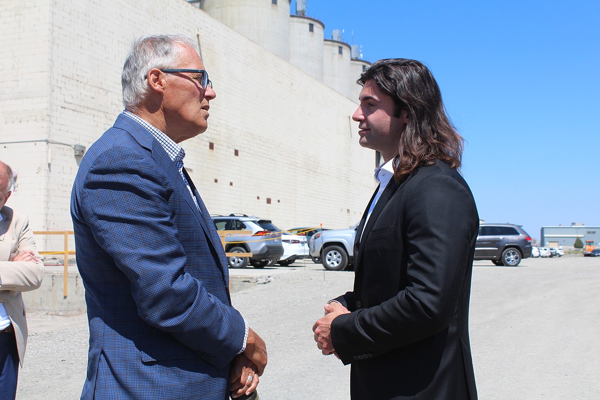 Twelve cofounder and CEO Nicholas Flanders, right, talks with Washington Gov. Jay Inslee during the groundbreaking for the company’s new Moses Lake facility Tuesday.