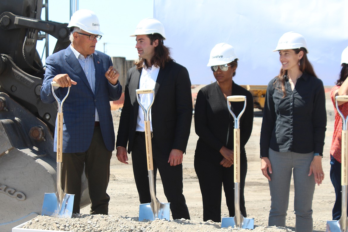 From left, Gov. Jay Inslee with Twelve cofounders Nicholas Flanders, Etosha Cave and Kendra Kuhl Tuesday.