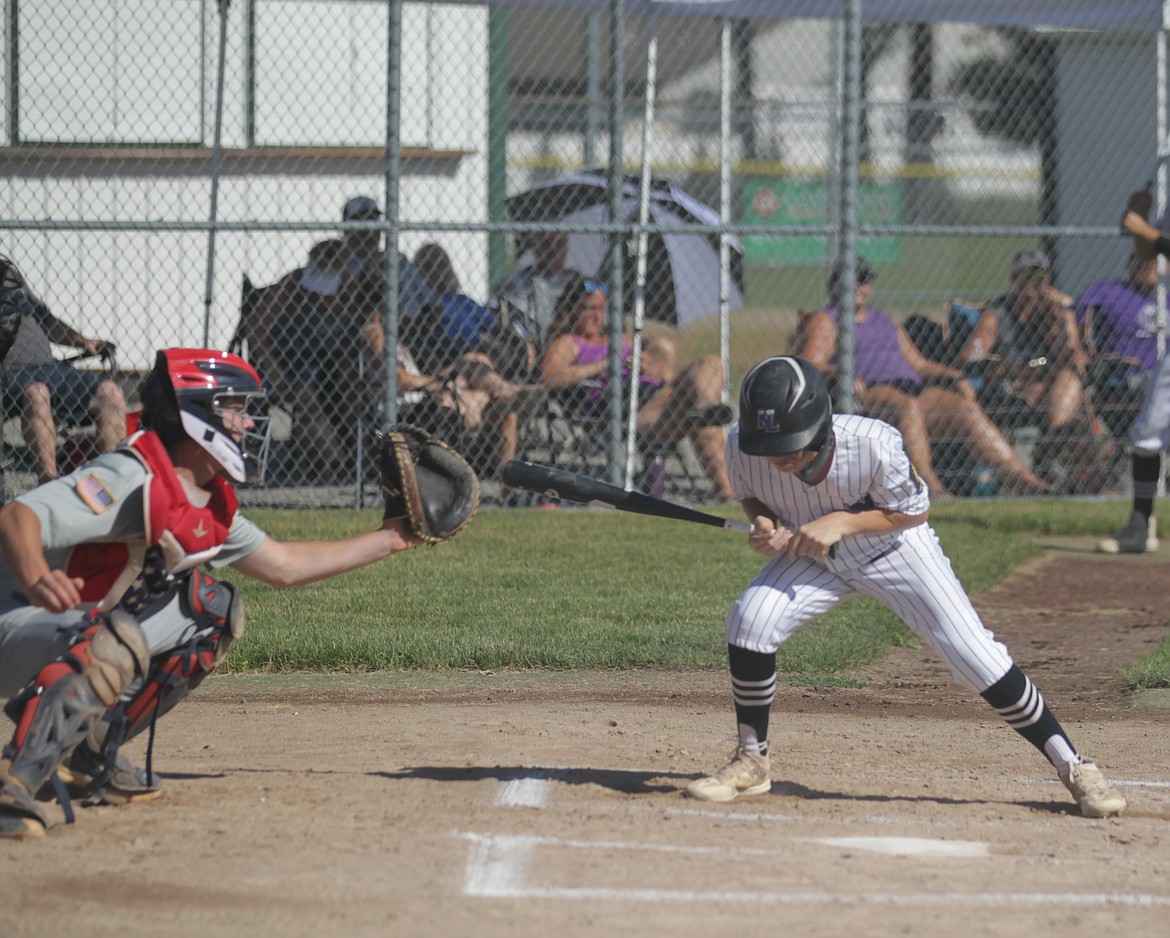 JASON ELLIOTT/Press
Northern Lakes hitter Caleb Mason ducks out of the way of a wild pitch during the first inning of Wednesday's game against Camas Prairie at Gorton Field in Rathdrum.