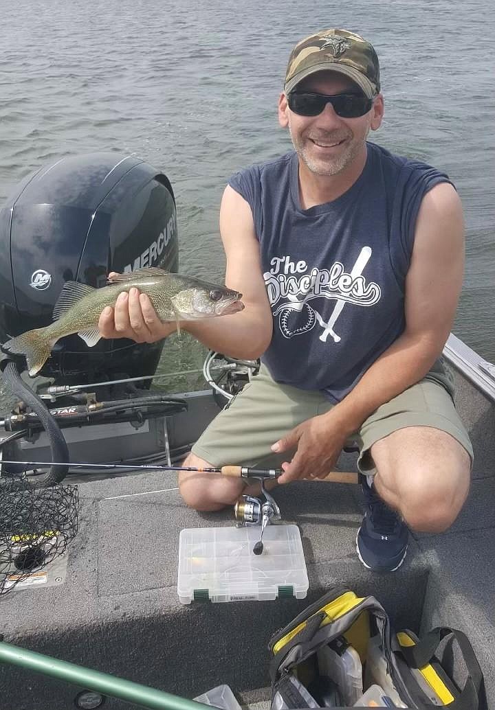 Lake Pend Oreille angler Chris Lewandowski with a walleye.