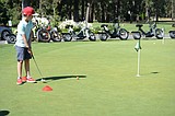 Kids take a swing at golf camp