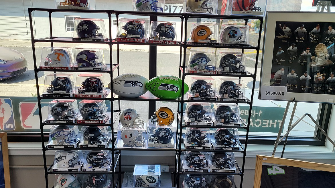 While collectible cards are the main staple of The Cardman, the shop also carries signed sports gear, photos and other memorabilia. Co-owner Darren Donoghue said he’s excited about the progress that’s been made by Washington teams such as the Kraken in bringing notoriety to the state’s athletic teams.