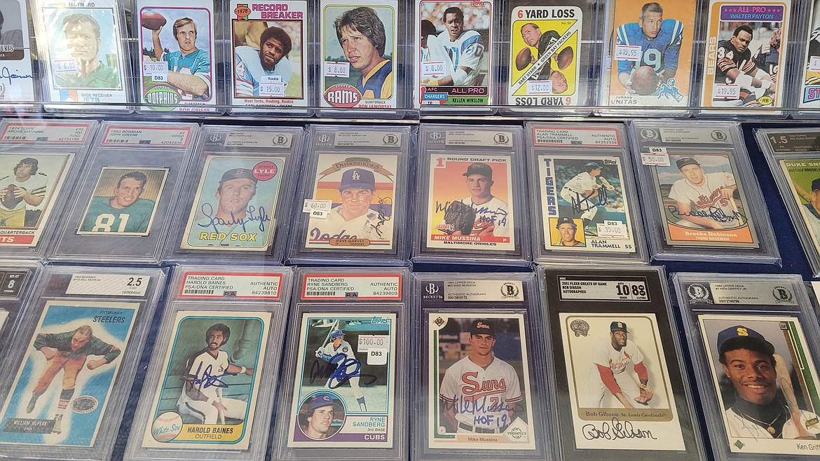 Several of the sports cards available for purchase at The Cardman include signed swag from White Sox Outfielder Harold Baines, Cubs Third Baseman Ryne Sandberg and Bob Gibson of the St. Louis Cardinals. Football, basketball, hockey and other sports are also represented in the shop’s collection.