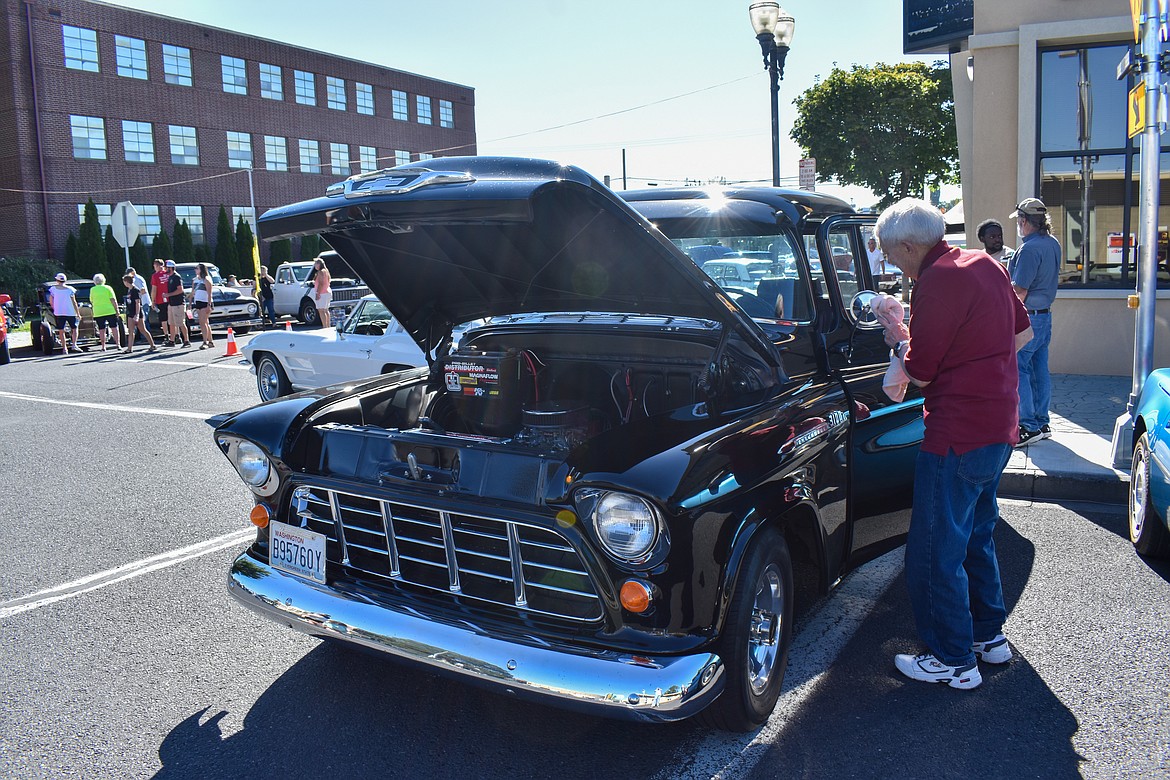 Kelly Cash of Coulee Dam shines his 1956 Chevrolet half-ton pickup.