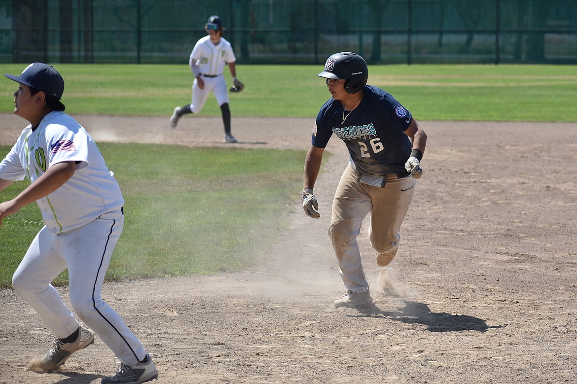 River Dog Joel Manring runs to second base during the Babe Ruth North Washington State Tournament’s title game on July 9.