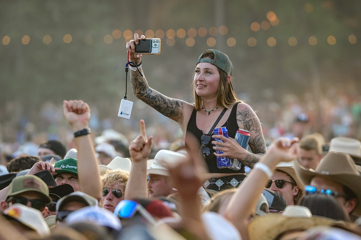 A fan rides gets a better view on someone's shoulders at Under the Big Sky on July 15. (JP Edge photo)