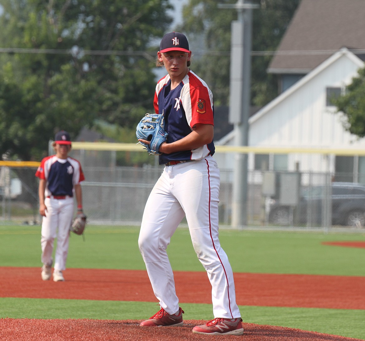 Zeke Roop gets ready to throw a pitch in a game against the Northern Lakes Mountaineers in the Class A District A Legion tournament.